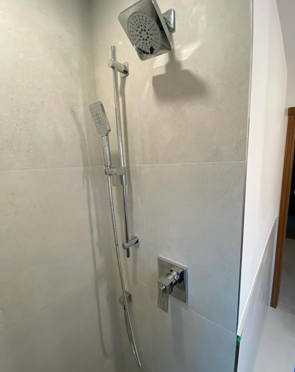 Blais Plumbing project: Chrome shower fixtures